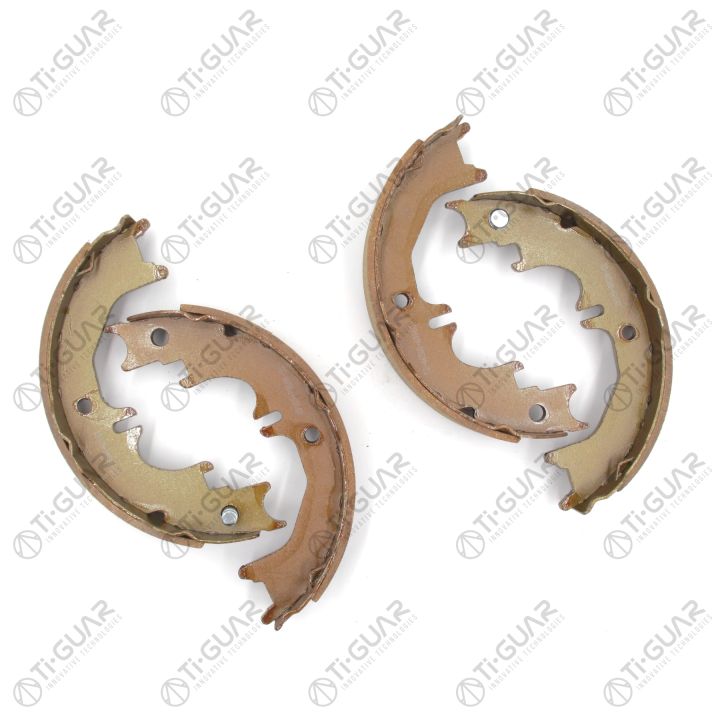 Тормозные колодки (КОМПЛЕКТ 4шт/РУЧНОГО ТОРМОЗА) TG-46580-60060/FN0642* Ti·GUAR Тормозные колодки (КОМПЛЕКТ 4шт/РУЧНОГО ТОРМОЗА) TG-46580-60060/FN0642* Ti·GUAR